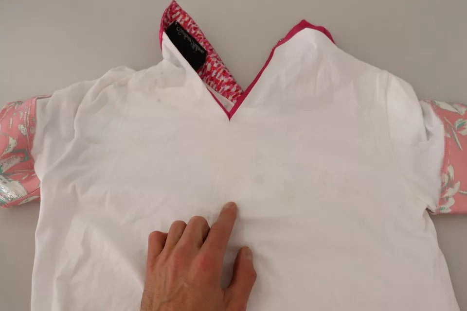 T-shirt blanc Dolce & Gabbana Sartoria à col large avec boutons, vue de face.