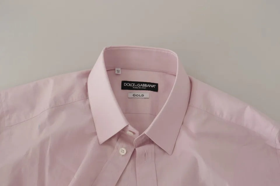 Robe en coton rose clair Dolce & Gabbana pour homme, élégante et formelle, avec chemise en or assortie, vue de face.