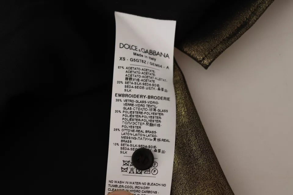 Chemise en soie Dolce & Gabbana à broderie or, motif couronne métallique, élégant haut de style luxueux.
