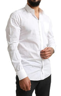 Chemise de smoking blanche en coton Dolce & Gabbana avec détails dorés, élégante et formelle, vue de face.