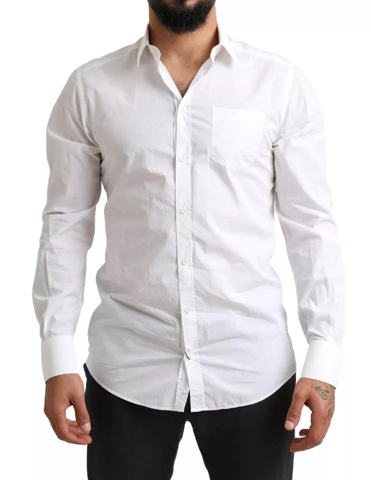 Chemise de smoking en coton blanc Dolce & Gabbana avec détails dorés, style formel et élégant, vue de face.