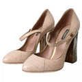 Chaussures Mary Janes en cuir beige de Dolce & Gabbana avec embellissements, élégantes et sophistiquées.