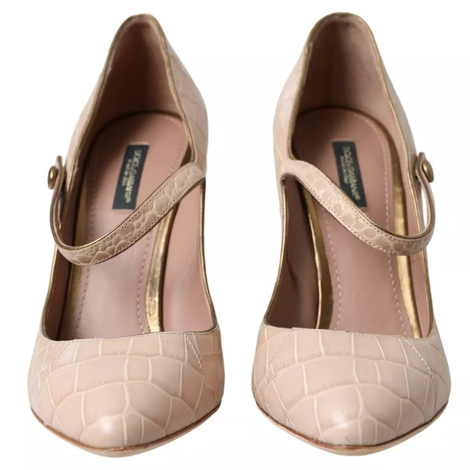 Chaussures Mary Janes en cuir beige de Dolce & Gabbana avec embellissements, style élégant et sophistiqué.