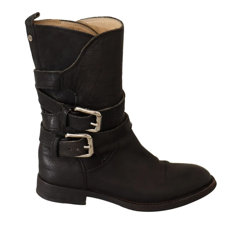 Bottes en cuir noir Dolce & Gabbana, mi-mollet, avec boucle élégante et look sophistiqué, vue de face.
