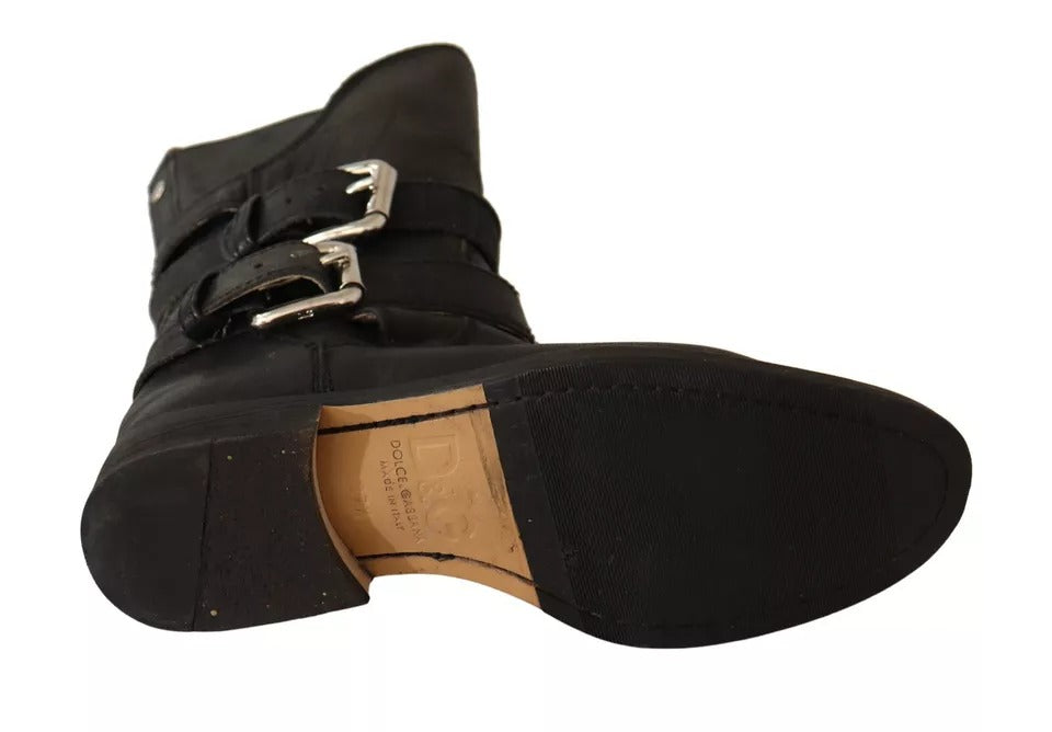 Bottes en cuir noir Dolce & Gabbana, mi-mollet avec boucle élégante, chaussures de mode sophistiquées.