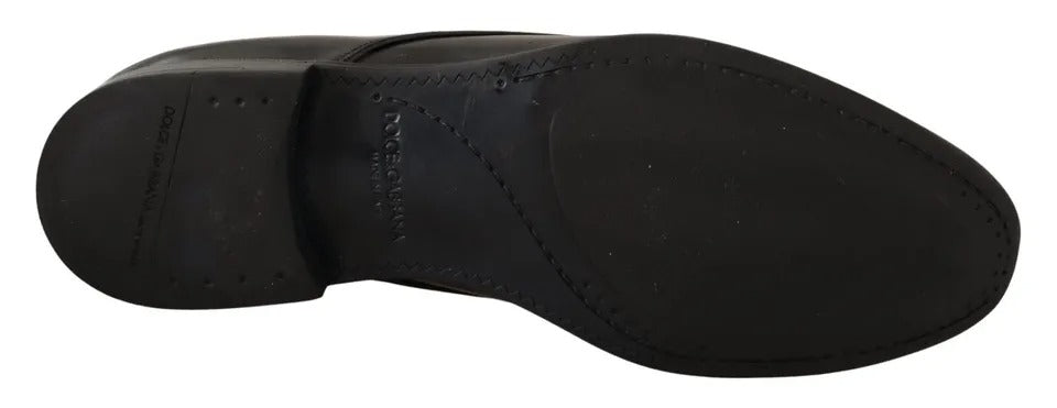 Chaussures derby en cuir noir Dolce & Gabbana pour hommes, chaussures formelles élégantes avec semelle en cuir et design sophistiqué.