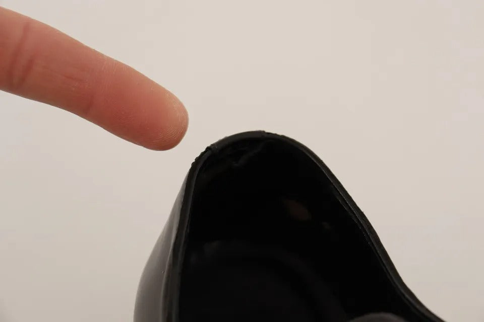 Chaussures de ville Derby en cuir noir de la marque Dolce & Gabbana, élégantes et formelles, pour homme.