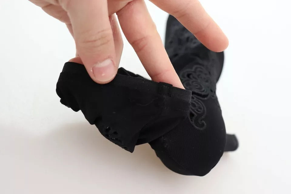 Chaussures Dolce & Gabbana à talons noirs en stretch, bottines florales en dentelle élégantes pour femmes.