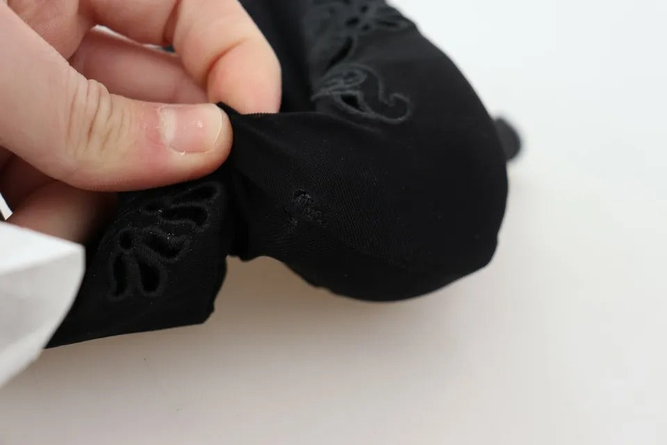 Chaussures Dolce & Gabbana noires, bottines à stretch avec fleurs en dentelle, style élégant et tendance.