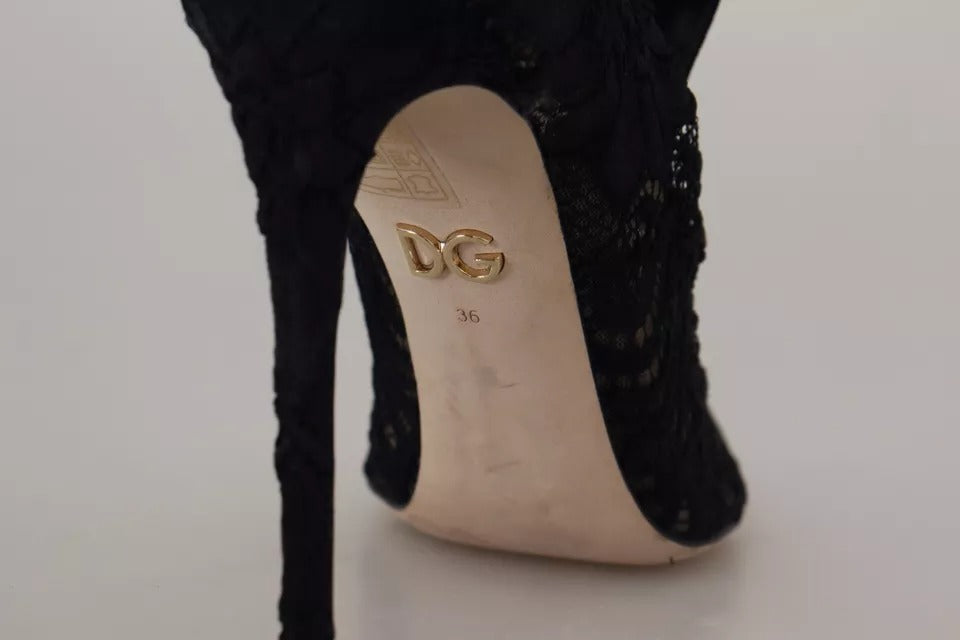 Chaussettes noir extensibles Dolce & Gabbana avec dentelle Taormina, portées avec des bottines élégantes.