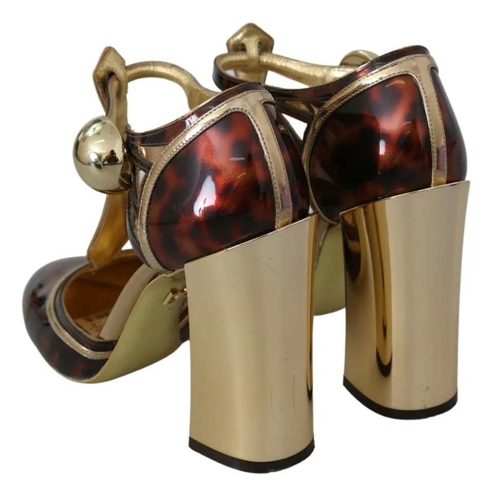 Escarpins Dolce & Gabbana à talon T-strap or et motif léopard, chaussures élégantes et tendance.