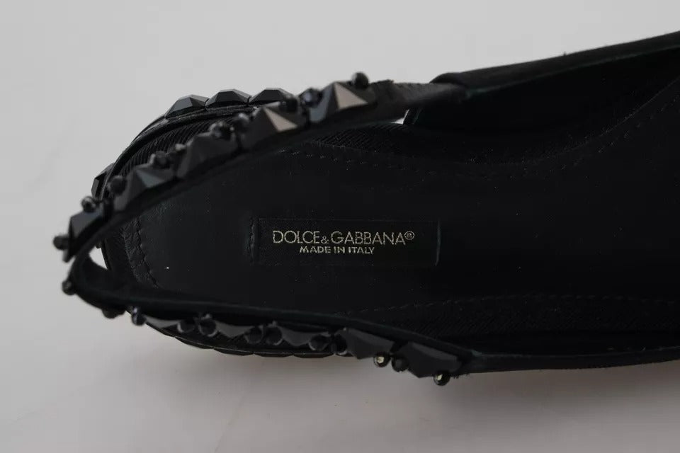 Chaussures plates noires Dolce & Gabbana en satin avec cristaux et bride à l'arrière, style élégante et sophistiquée.