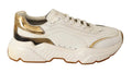 Chaussures sport Dolce & Gabbana Daymaster en cuir blanc et or, baskets élégantes avec détails modernes et semelle confortable.