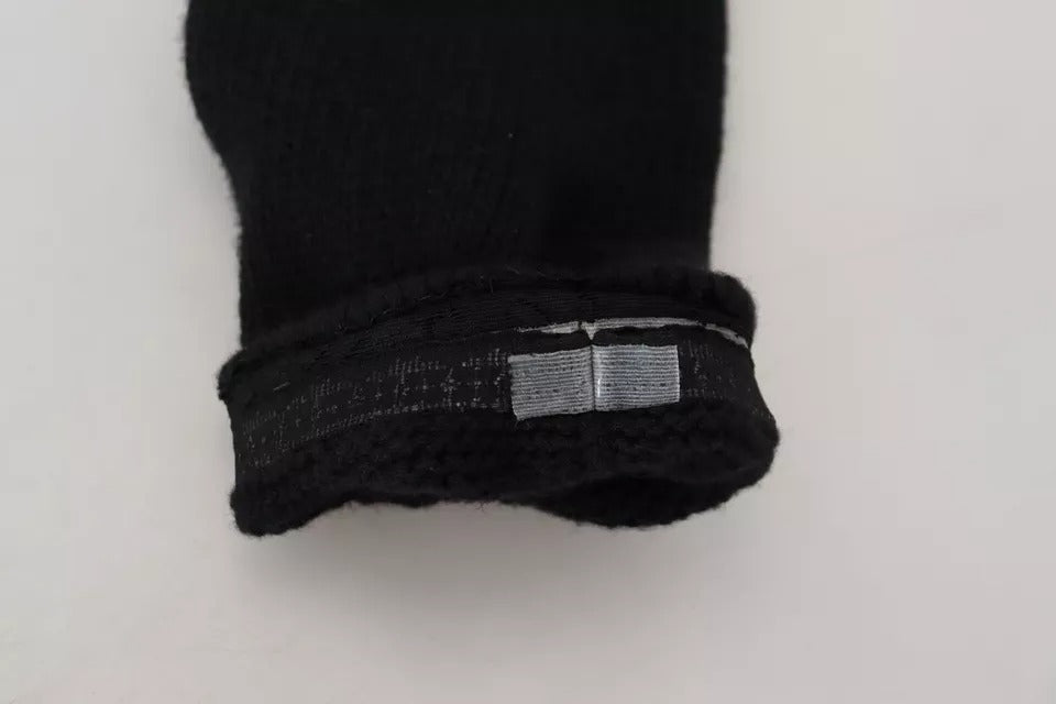 Chaussettes longues en laine noire pour femmes de Dolce & Gabbana, accessoire élégant et confortable jusqu'au mollet.