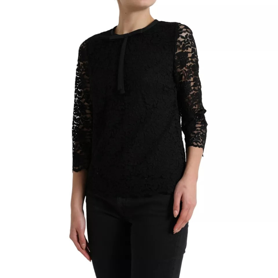 Blouse Dolce & Gabbana en dentelle florale noire, style décontracté avec col rond et manches courtes.