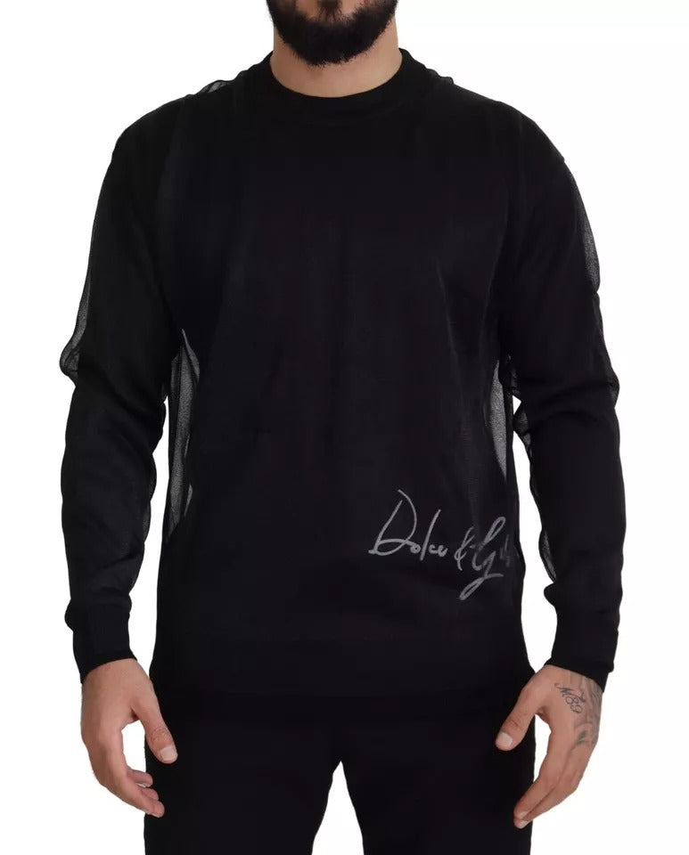 Pull à manches longues Dolce & Gabbana en polyester noir avec logo, porté par un homme, design élégant et moderne.
