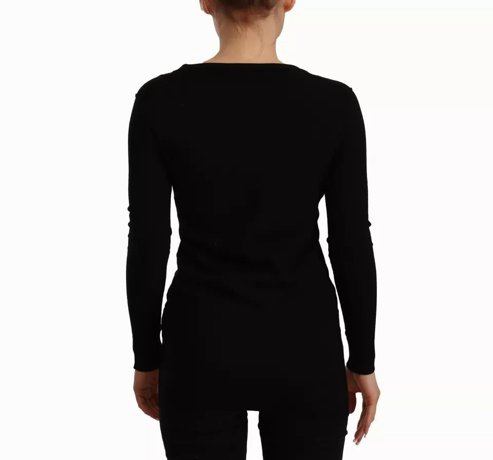 Cardigan en laine noire Dolce & Gabbana avec boutons, pull à manches longues, détail tricoté élégant et classique.