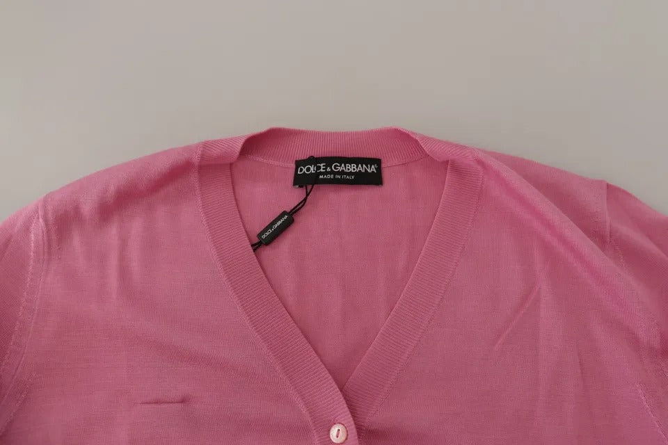 Cardigan Dolce & Gabbana en soie rose à boutons, pull élégant en 100% soie avec col et manches longues.