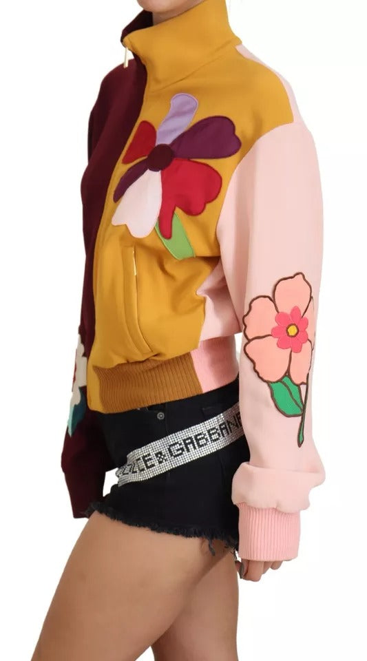 Pull Dolce & Gabbana à fleurs multicolores en viscose avec fermeture éclair complète, affichant un motif floral vibrant.