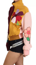 Pull Dolce & Gabbana à fleurs multicolores en viscose avec fermeture éclair complète, affichant un motif floral vibrant.