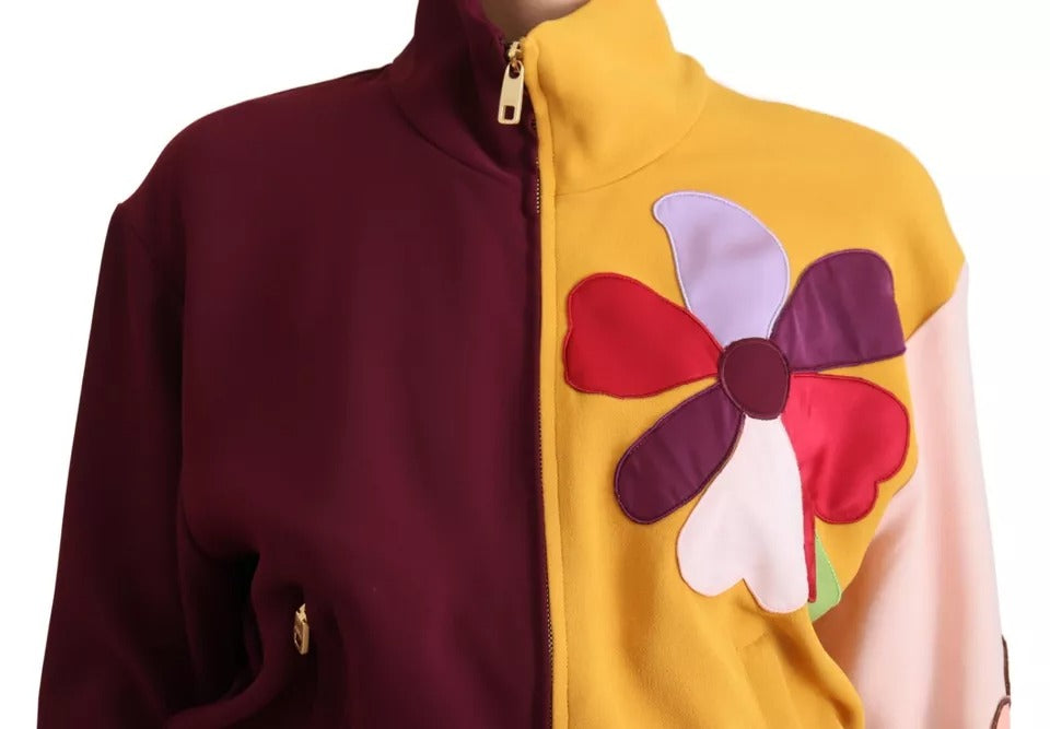 Pull Dolce & Gabbana en viscose à fleurs multicolores avec zip complet, motif floral coloré visible sur l'image.
