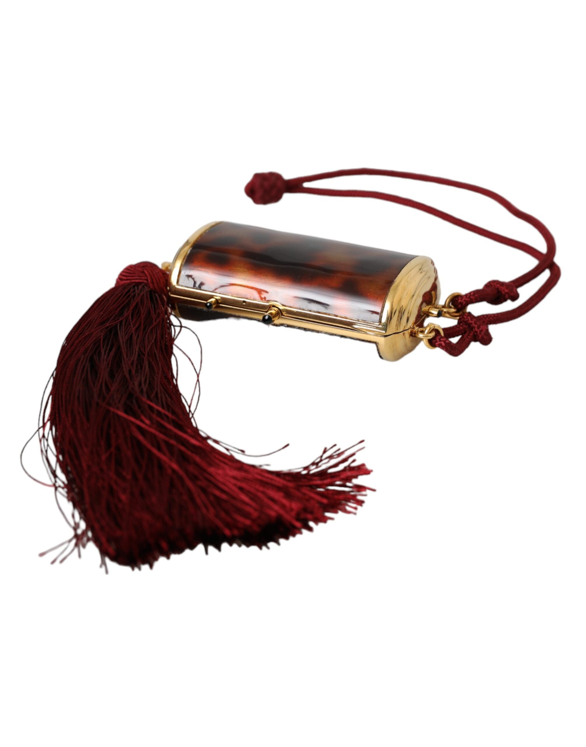 Pochette à maquillage Dolce & Gabbana en cuir marron avec motif léopard, miroir mini et tassels élégants.