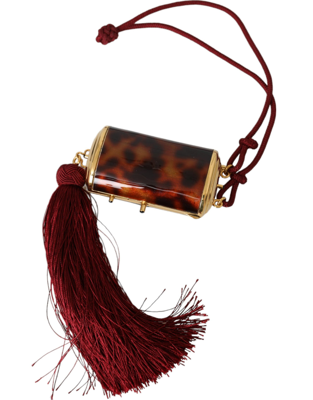 Pochette de maquillage Dolce & Gabbana marron avec motif léopard, miroir miniature et pompons en franges.