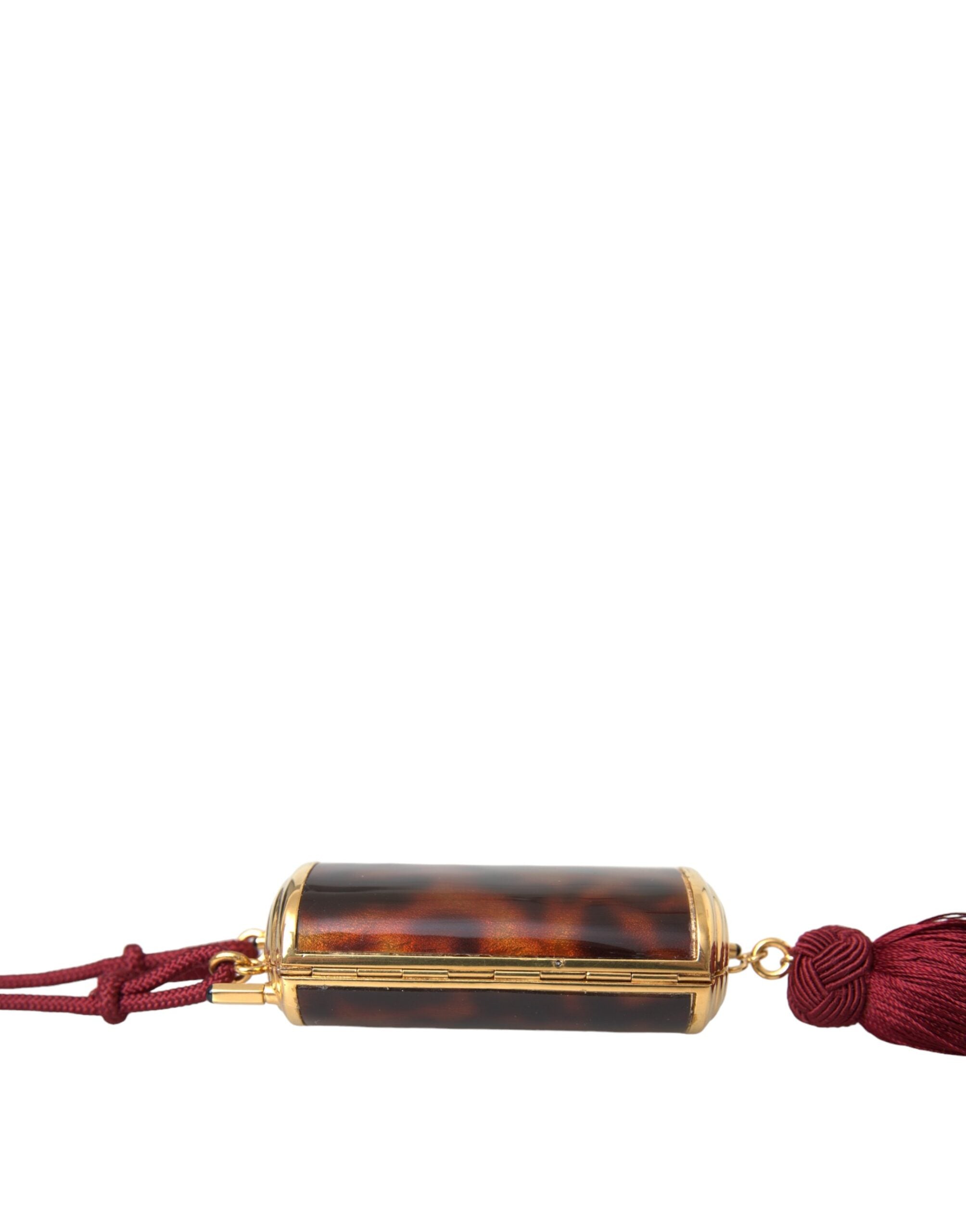 Sac à maquillage Dolce & Gabbana marron à imprimé léopard avec miroir mini et pompons en tassel, élégant et pratique.
