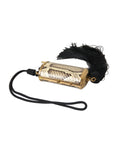 Pochette Dolce & Gabbana beige en cuir exotique avec miroir mini, tassels et espace pour maquillage.