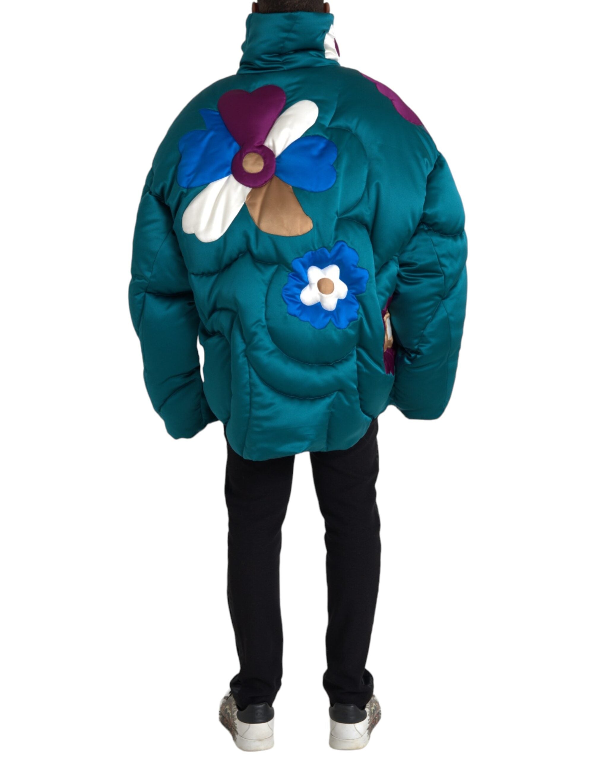 Veste matelassée Dolce & Gabbana multicolore à fleurs, coupe-vent et style puff, visible en détail dans l'image.