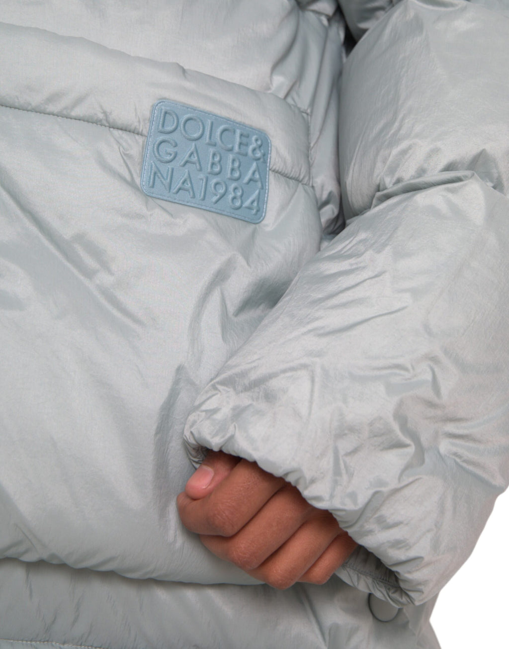 Veste matelassée à capuche pour homme Dolce & Gabbana Light Blue, coupe chaude et élégante, en tissu rembourré.