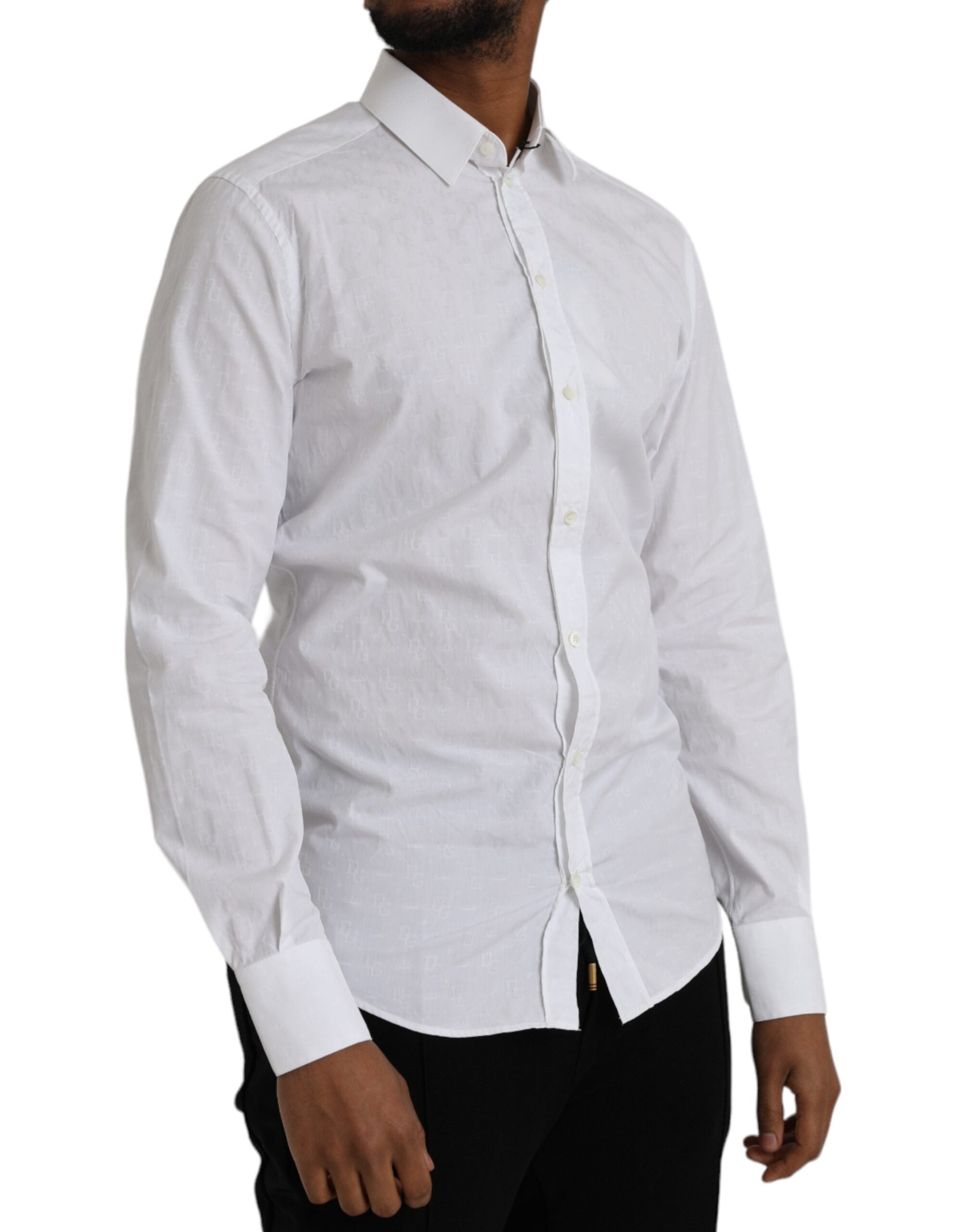 Robe blanche en coton à manches longues de Dolce & Gabbana, avec une touche dorée sur le col et les poignets.