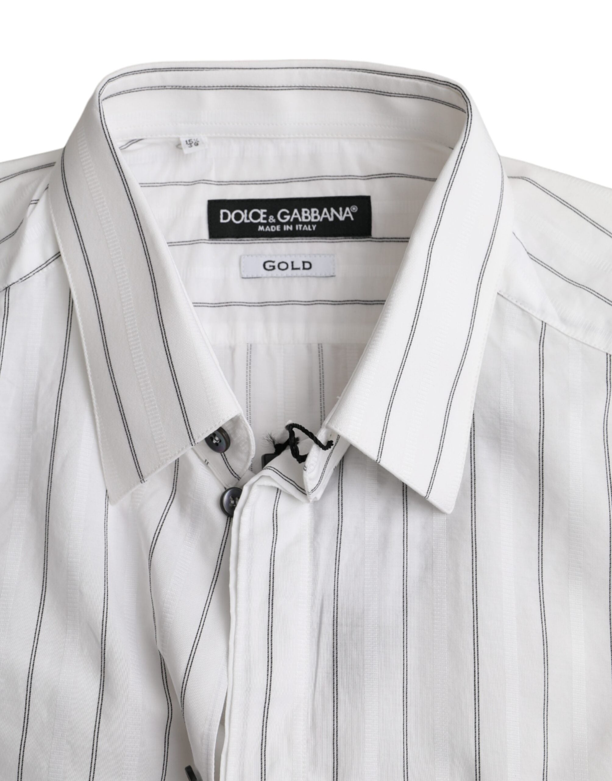 Robe de soirée Dolce & Gabbana noire et blanche à rayures avec chemise en or brillante, élégante et sophistiquée.