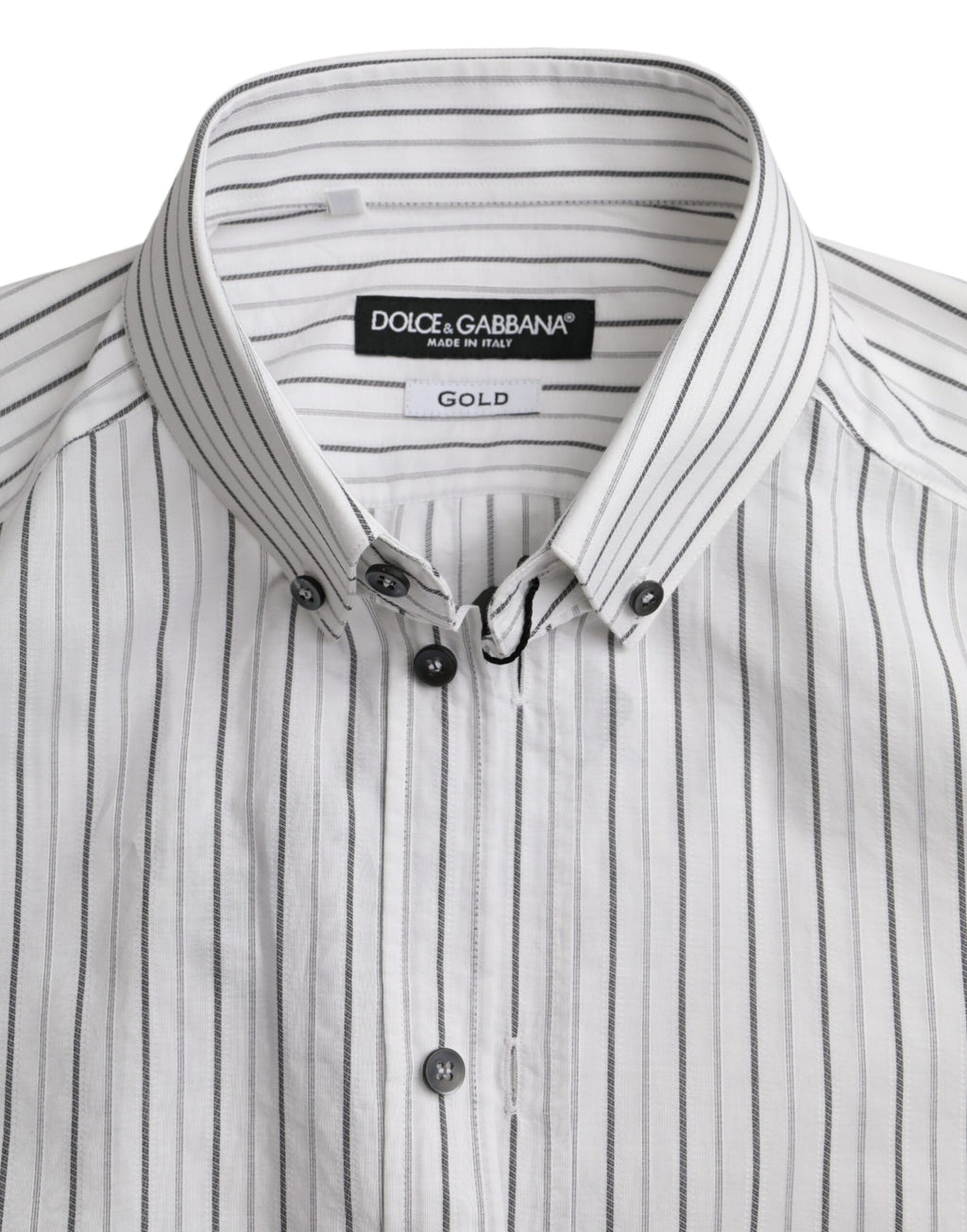 Robe de soirée Dolce & Gabbana noire et blanche à rayures avec chemise en or, élégante et sophistiquée.