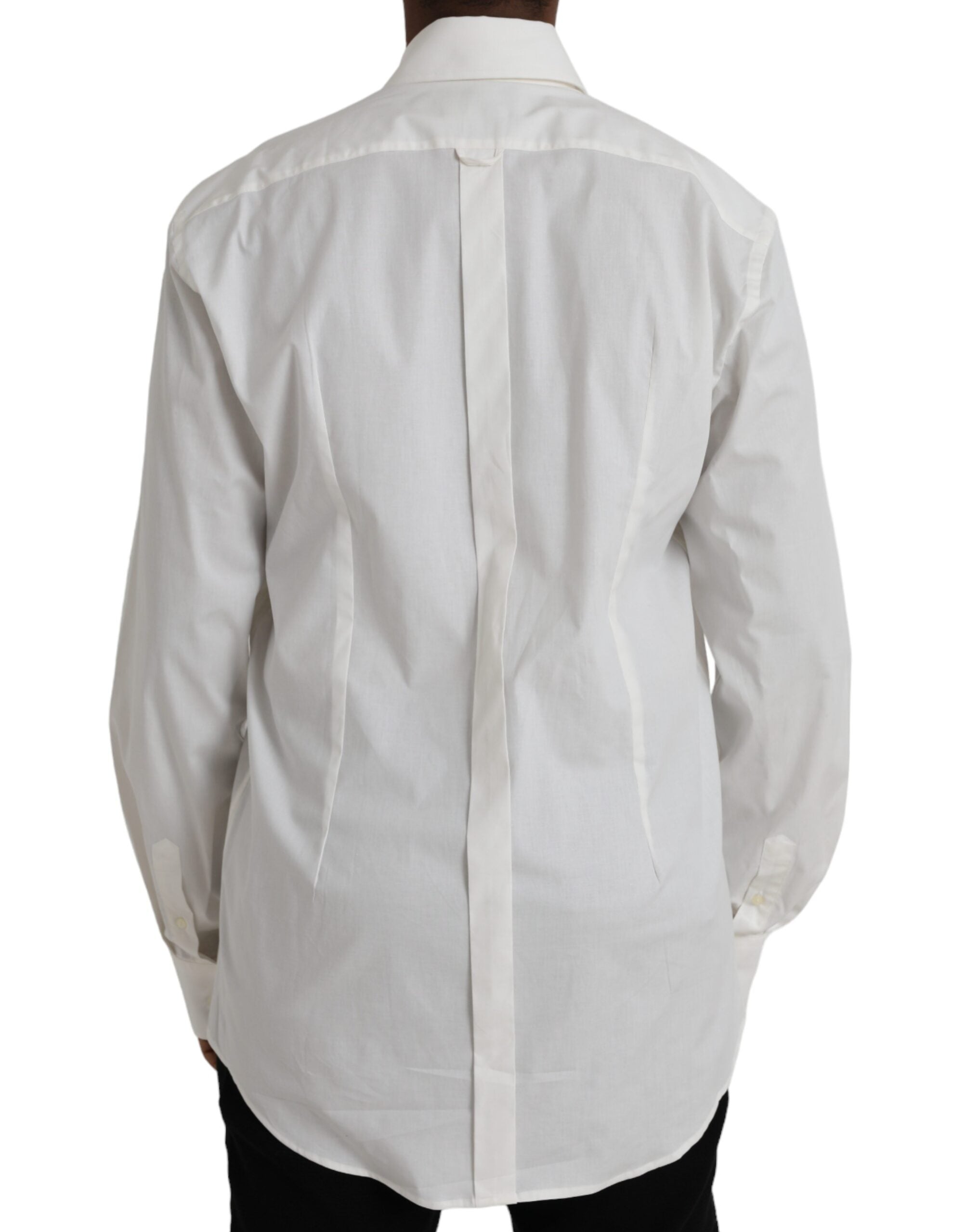 Robe blanche en coton Dolce & Gabbana, coupe slim, avec une chemise dorée élégante visible à l'avant.