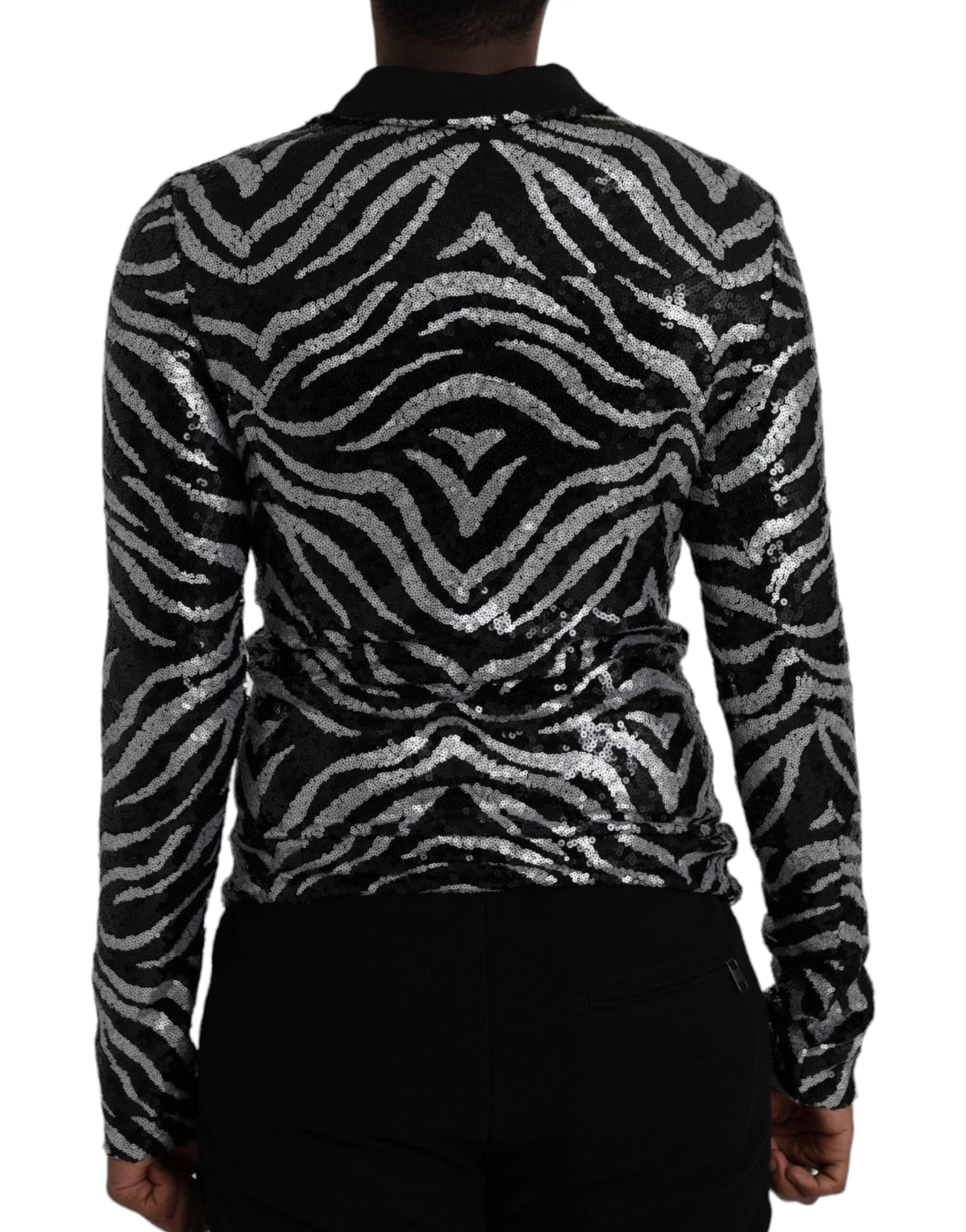 Pull en polyester noir et argenté Dolce & Gabbana avec sequins, élégant et brillant, idéal pour une tenue sophistiquée.