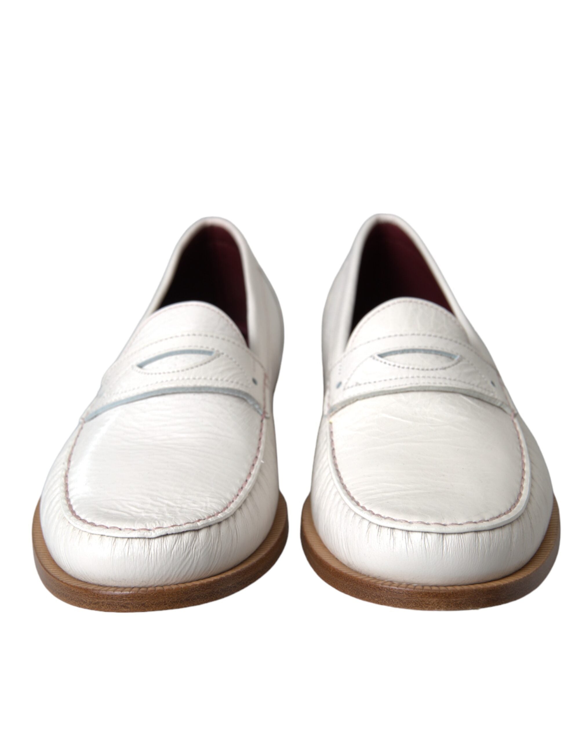 Mocassins Dolce & Gabbana en cuir blanc, chaussure slip-on élégante pour homme, vue de face sur fond neutre.