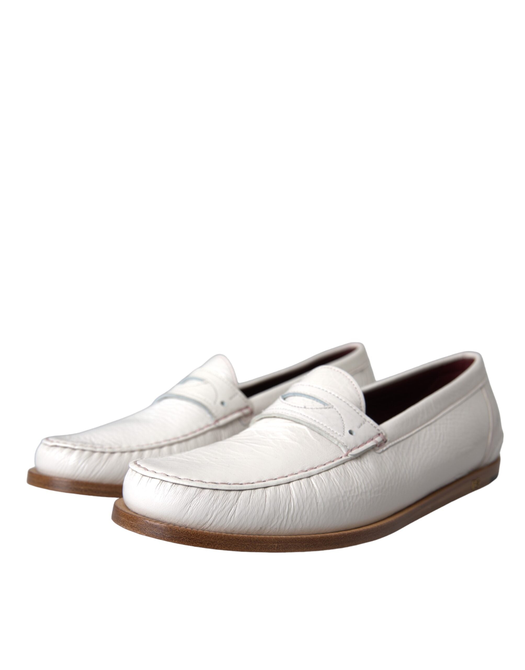 Chaussures mocassins en cuir blanc Dolce & Gabbana, slip-on, élégantes et confortables pour homme.