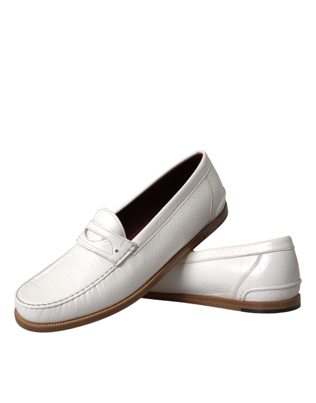 Mocassins Dolce & Gabbana en cuir blanc, chaussures slip-on élégantes pour homme avec finition soignée.