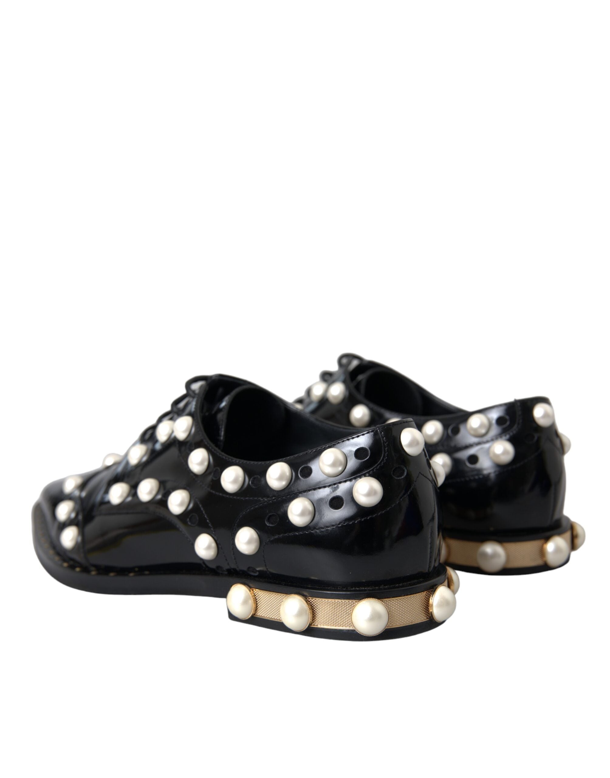 Chaussures Dolce & Gabbana en cuir noir avec détails de perles faux, style broque, pour femme.