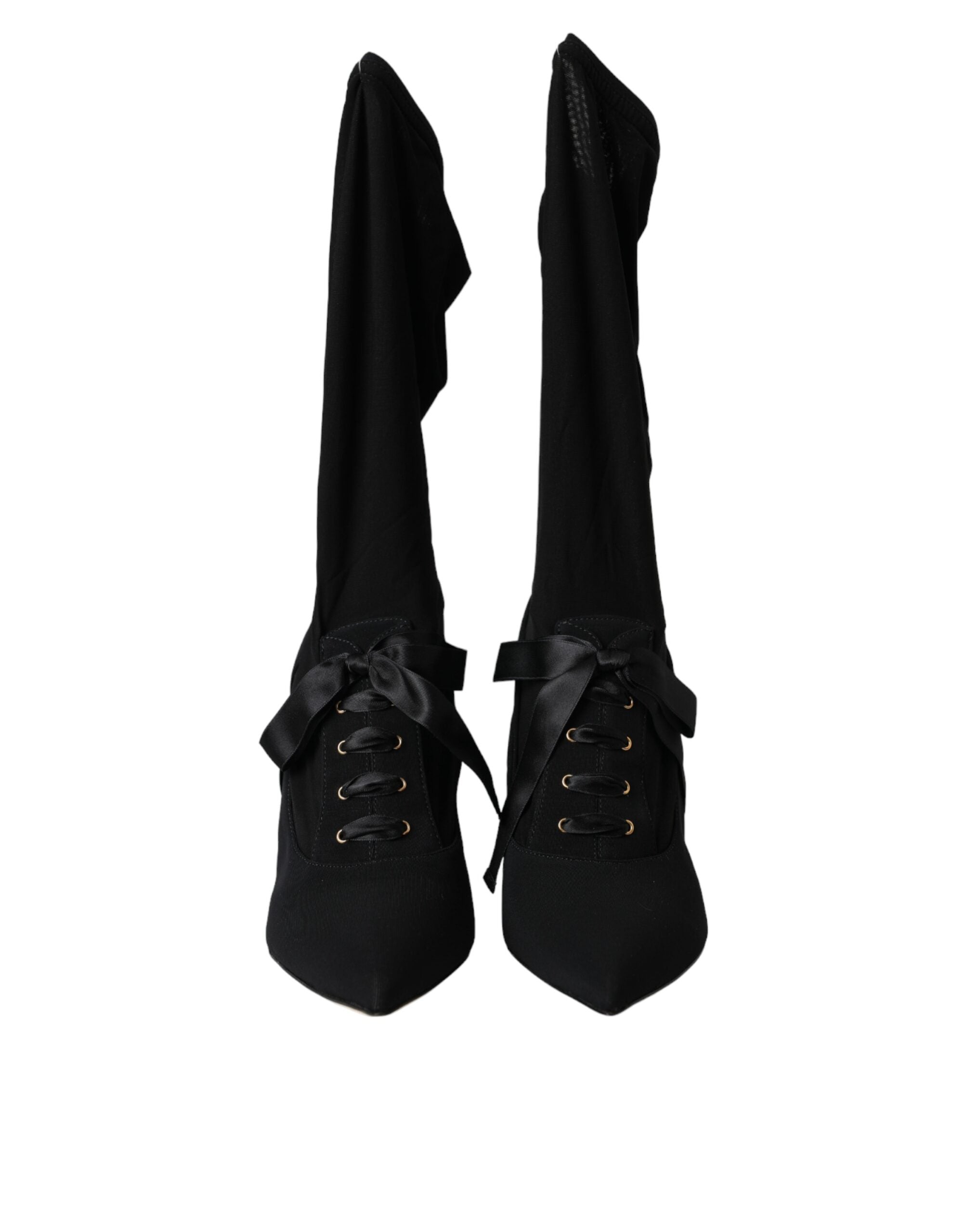 Chaussures Dolce & Gabbana, bottines noires à talons stilettos et mi-mollet, en cuir élégante et sophistiquée.
