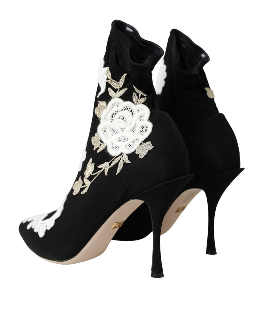 Bottes slip-on Dolce & Gabbana noires et blanches avec broderie élégante, chaussures modernes et stylées.