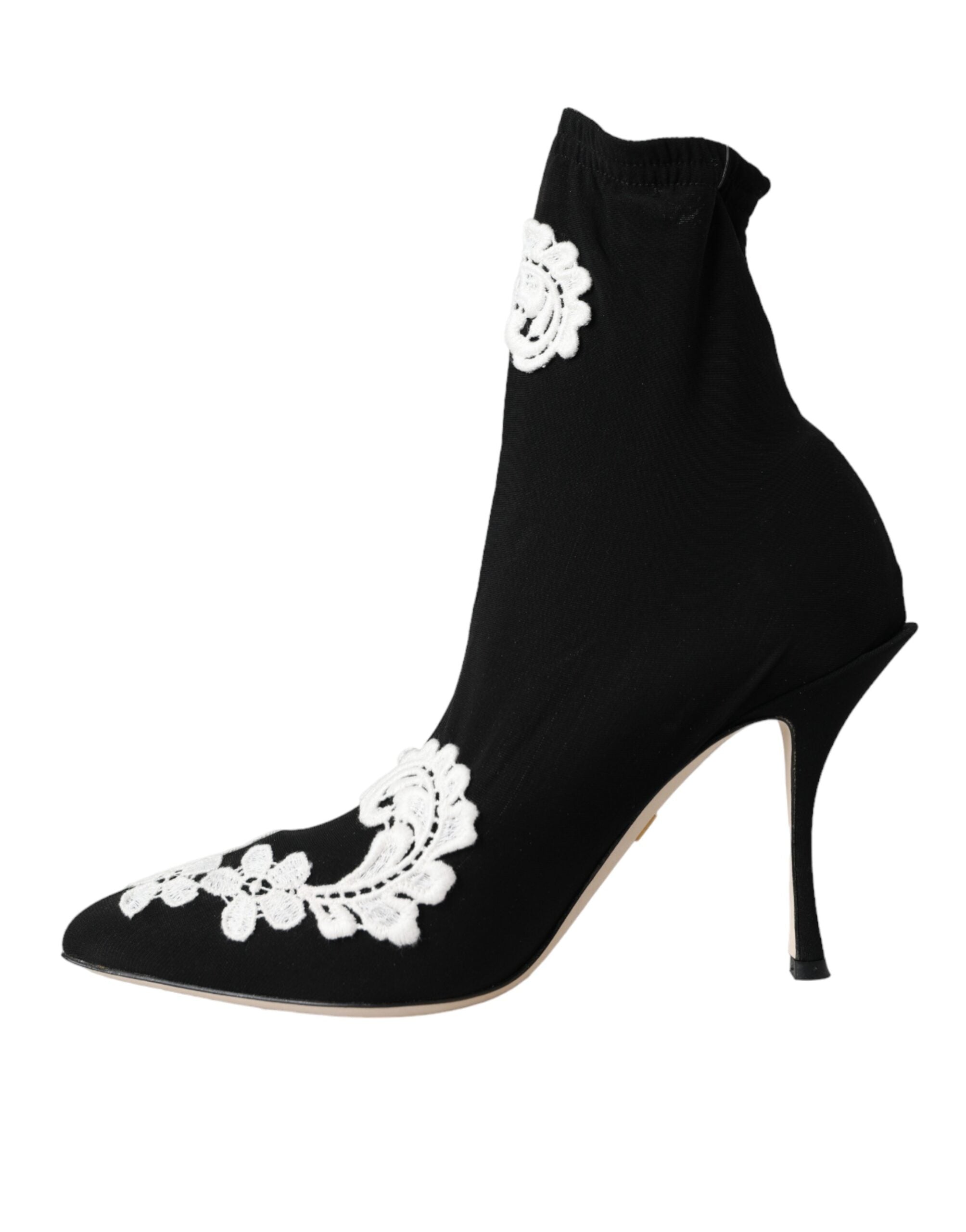Chaussures slip-on Dolce & Gabbana noires et blanches avec broderie élégante, chaussures à enfiler en style sophistiqué.