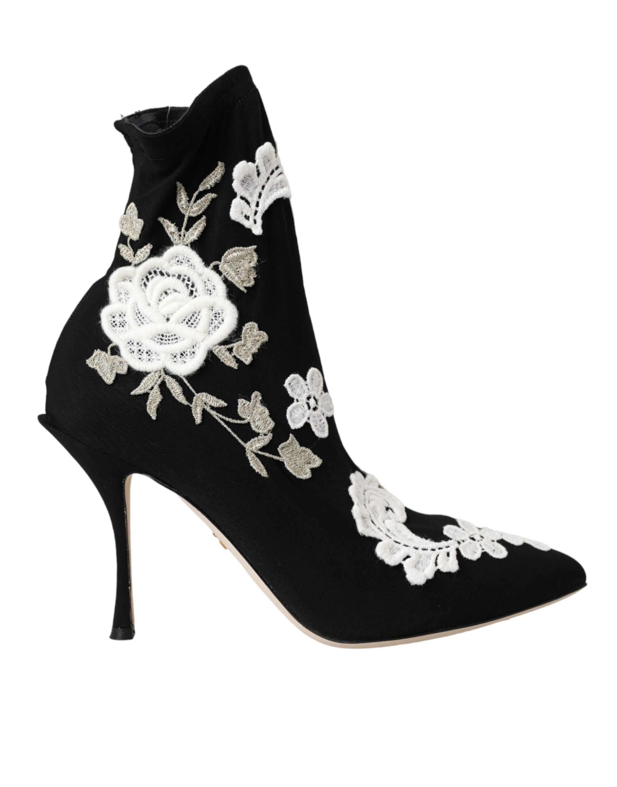 Bottes slip-on Dolce & Gabbana noires et blanches avec broderie élégante et design sophistiqué, vue de face.