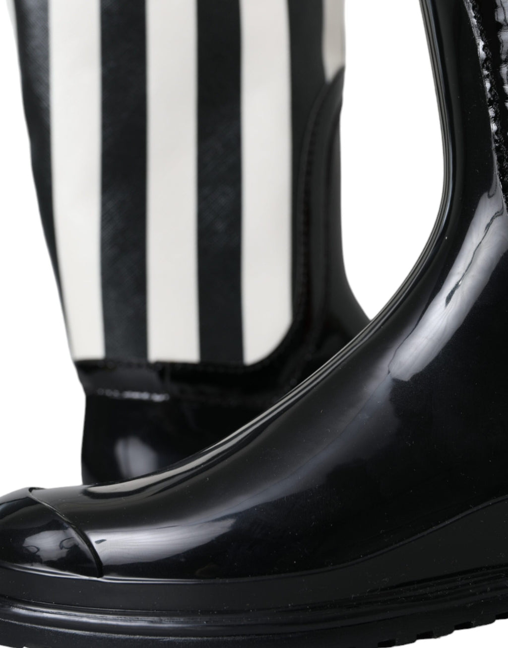 Bottes plates en caoutchouc noir Dolce & Gabbana, hauteur genou, chaussures élégantes et modernes pour femme.