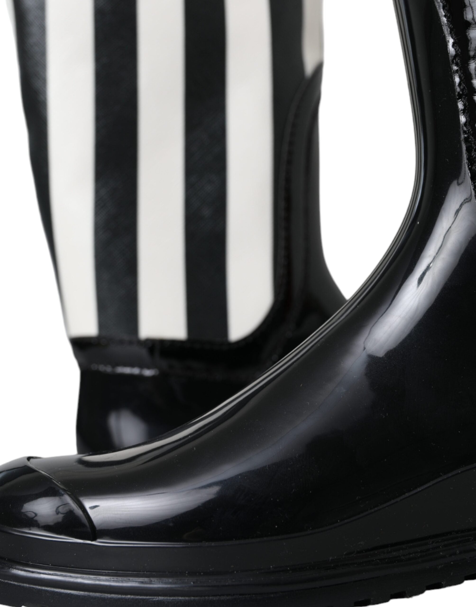 Bottes plates en caoutchouc noir Dolce & Gabbana, hauteur genou, chaussures élégantes et modernes pour femme.