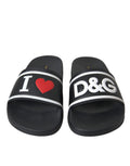Sandales Dolce & Gabbana en cuir noir "I Love D&G" avec semelle plate et design élégant, vues de face sur fond neutre.
