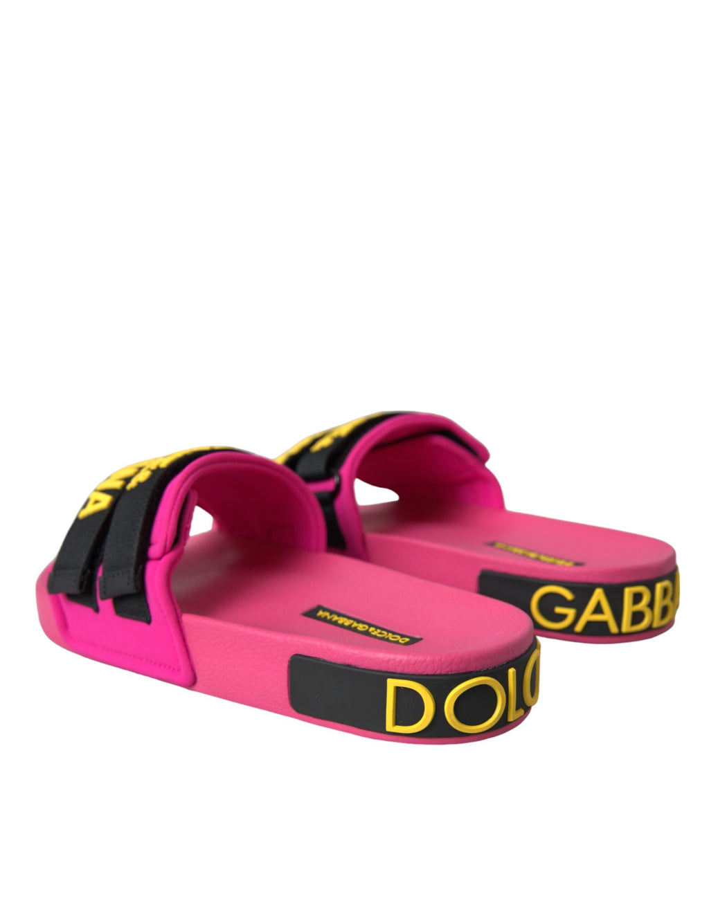 Sandales plates Dolce & Gabbana logo rose et noire, chaussures de plage élégantes avec design coloré et confortable.