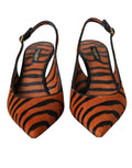 Chaussures slingbacks en cuir noir, orange et zèbre de Dolce & Gabbana, motifs animalier et design élégant.