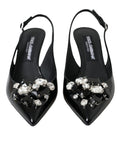 Chaussures à talons en cuir verni noir Dolce & Gabbana avec cristaux, sandales slingback élégantes.